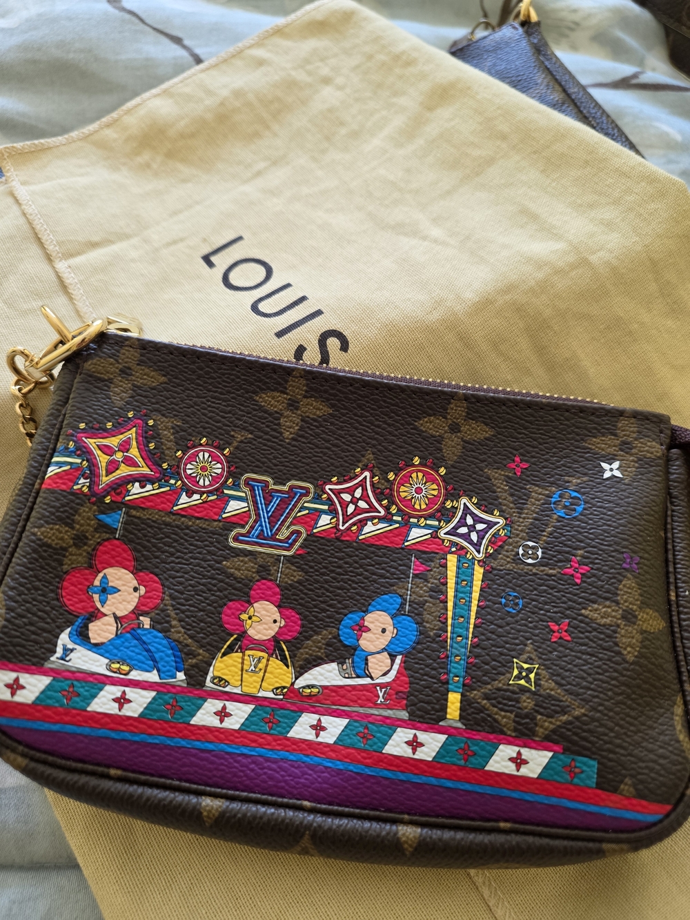 Louis Vuitton Christmas Monogram Mini Pochette Accessoires
